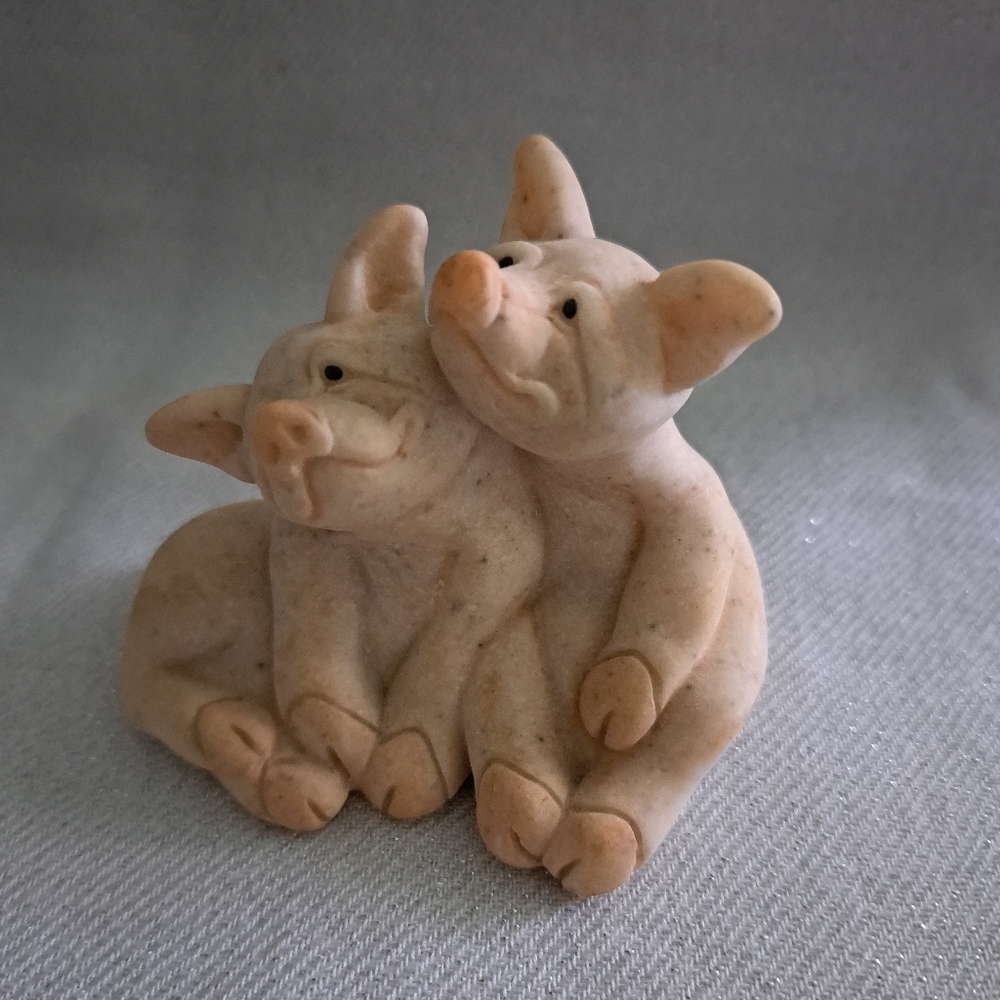 Ornament of One little piggy couple. Pepper and Posh.